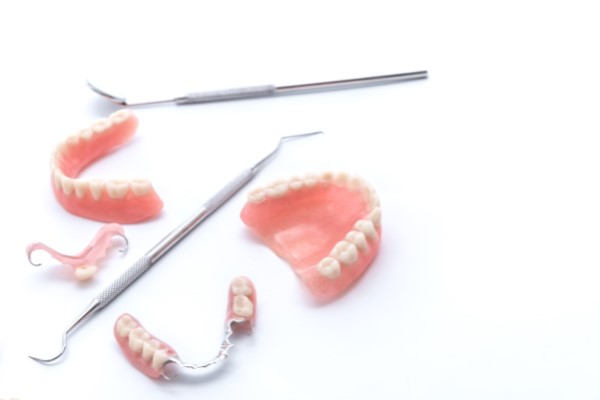 When Does A Dentist Use Partial Dentures To Replace Missing Teeth?